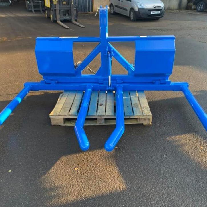 HD double fold up wrapped bale handler finished in New Holland blue